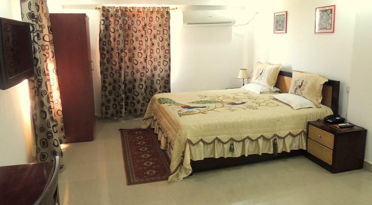 Готель Aroma Residency Tinsukia Екстер'єр фото