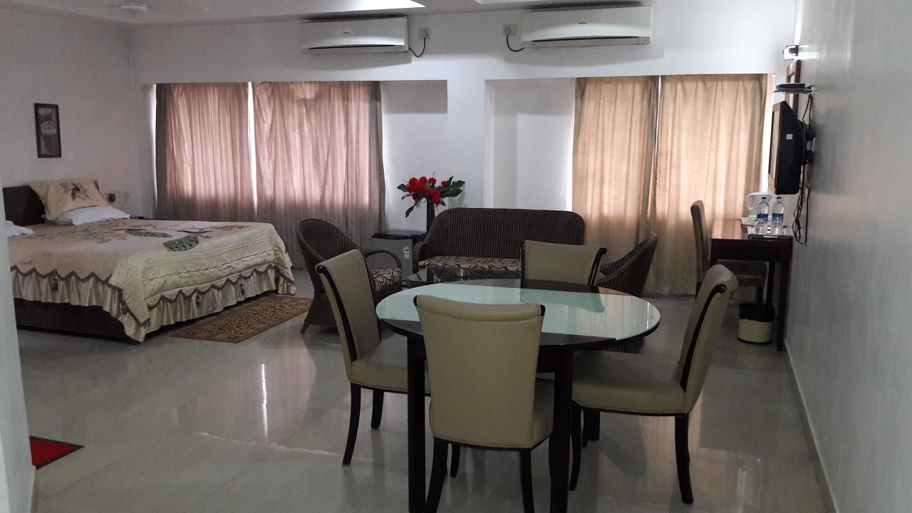 Готель Aroma Residency Tinsukia Екстер'єр фото